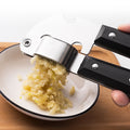 Vertex Kitchenware stainless steel garlic press with ergonomic handle for easy garlic crushing and mincing.