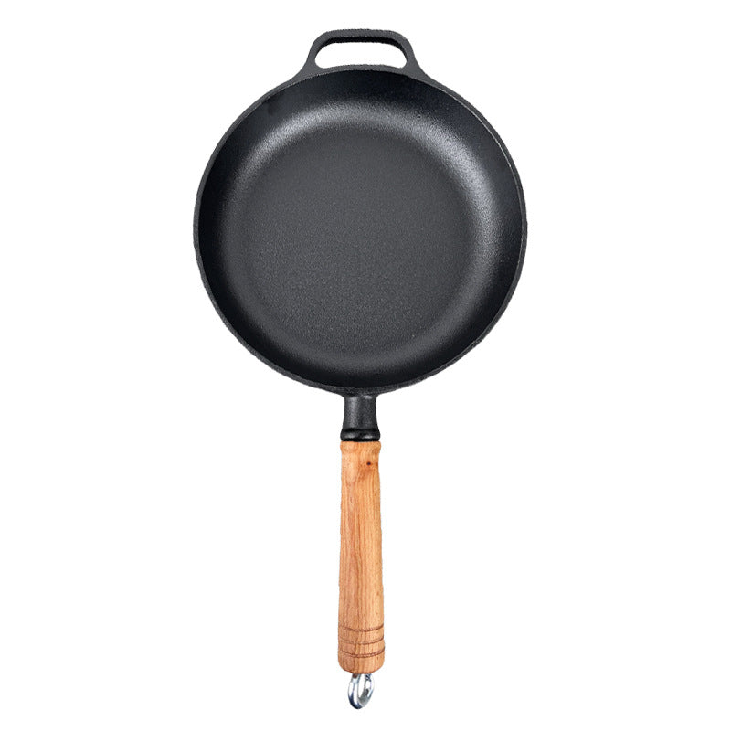 Pre-seasoned matte black cast iron skillet by Vertex Kitchenware, showing a sturdy, well-seasoned pan ready for cooking.