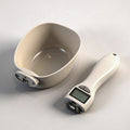 Digital kitchen scale and measuring spoon from Vertex Kitchenware, showing a modern digital display and stainless steel measuring tool.