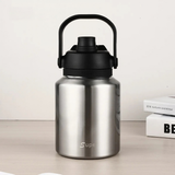 Silver insulated stainless steel jug with straw, drinkware by Vertex Kitchenware, designed for hot or cold beverages.