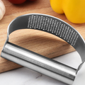 Silver stainless steel Vertex Kitchenware garlic press, precision tool for easily crushing garlic cloves.