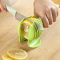 Vertex Kitchenware multi-use fruit slicer with ergonomic handle, designed for easy slicing of vegetables and fruits.